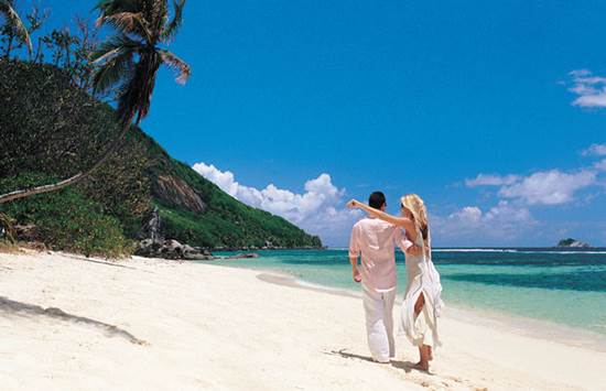 A Couple on the Beach at Seychelles
